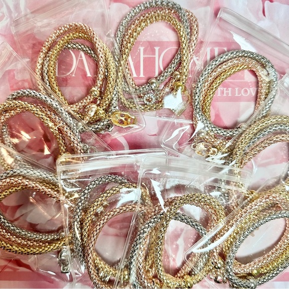 NWOT-3PC TRI-GOLD STACKABLE/ELASTIC BANGLES - Picture 4 of 6